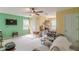 Large bedroom features neutral carpet, windows, and bright green accent wall at 1101 Parkland Se Run, Smyrna, GA 30082