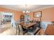 Charming dining room featuring wood floors, chandelier, and easy access to living spaces at 1101 Parkland Se Run, Smyrna, GA 30082