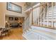 Inviting foyer with a staircase and a view into the living room of a meticulously kept home at 1101 Parkland Se Run, Smyrna, GA 30082