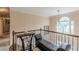 Hallway features bright window, decorative lighting, and comfortable seating at 1101 Parkland Se Run, Smyrna, GA 30082