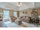 Living room with coffered ceiling, carpet flooring, and traditional furniture at 1101 Parkland Se Run, Smyrna, GA 30082