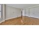 Spacious bedroom with hardwood floors, double closets, and neutral paint at 1324 Concord Sw Cir, Lilburn, GA 30047