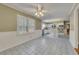 Open concept dining area adjacent to the kitchen, featuring tiled flooring and ample natural light at 1324 Concord Sw Cir, Lilburn, GA 30047