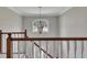 Spacious foyer with chandelier and staircase at 1324 Concord Sw Cir, Lilburn, GA 30047