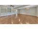Bright living room featuring hardwood floors, and built-in shelving at 1324 Concord Sw Cir, Lilburn, GA 30047