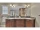 Main bathroom vanity with dual sinks, granite countertop, and custom cabinetry at 1324 Concord Sw Cir, Lilburn, GA 30047