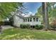 Back of the house, featuring a patio and steps leading to the backyard at 2716 Meadow Ridge Nw Dr, Duluth, GA 30096