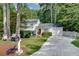 Inviting home featuring a mailbox, driveway, and well-maintained front lawn at 2716 Meadow Ridge Nw Dr, Duluth, GA 30096