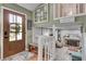 Inviting foyer with wooden front door and stairs leading to the second floor at 2716 Meadow Ridge Nw Dr, Duluth, GA 30096