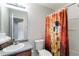 Bathroom featuring a shower/tub combo and decorative art printed shower curtain at 5351 Paramount View Way, Sugar Hill, GA 30518