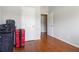 Bright room featuring hardwood floors, neutral walls, and great natural light, awaiting personalization at 5351 Paramount View Way, Sugar Hill, GA 30518