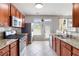 Well-equipped kitchen with stainless steel appliances and a view of the outdoor space at 5351 Paramount View Way, Sugar Hill, GA 30518
