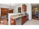 Kitchen area featuring granite countertops, tile backsplash, and stainless steel dishwasher at 5351 Paramount View Way, Sugar Hill, GA 30518