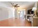 Bright and airy living room with a cozy fireplace and hardwood flooring at 5351 Paramount View Way, Sugar Hill, GA 30518
