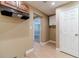 Finished basement hallway with access to laundry area and additional rooms at 664 Johnson Rd, Oxford, GA 30054