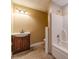 Bathroom featuring tile flooring, a vanity sink, and a shower-tub combo at 664 Johnson Rd, Oxford, GA 30054