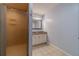 Bright bathroom with vanity, shower, and tile flooring at 664 Johnson Rd, Oxford, GA 30054