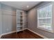 Walk-in closet with shelving and rod, adjacent to the window at 664 Johnson Rd, Oxford, GA 30054