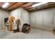 Unfinished basement with bare concrete walls and floor, boxes, and generator at 7430 Ramsgate Ct, Cumming, GA 30040