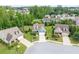 Inviting street showcasing well-maintained homes with manicured lawns and lush greenery at 7430 Ramsgate Ct, Cumming, GA 30040