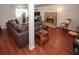 Finished basement with a large couch and stone fireplace at 125 Pebble Beach Ct, Atlanta, GA 30349