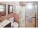 Bathroom featuring a shower with a door, toilet and vanity at 125 Pebble Beach Ct, Atlanta, GA 30349