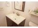Bathroom with a modern vanity, mirror, and updated sink hardware at 125 Pebble Beach Ct, Atlanta, GA 30349
