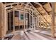 Unfinished attic space with exposed beams, framing, and a window offering natural light at 1406 Allene Sw Ave, Atlanta, GA 30310