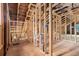 Spacious attic with exposed wooden beams, framing, and subflooring ready for customization at 1406 Allene Sw Ave, Atlanta, GA 30310