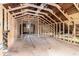 Unfinished attic space with exposed beams and framing ready for customization and build-out at 1406 Allene Sw Ave, Atlanta, GA 30310