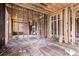 Interior space stripped down to its framing, showcasing the potential for a complete home renovation and customization at 1406 Allene Sw Ave, Atlanta, GA 30310