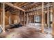 Stripped interior with exposed wood framing and ceiling awaiting complete renovation and customization at 1406 Allene Sw Ave, Atlanta, GA 30310