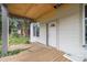 Covered porch with newly added supports and exposed plywood ceiling under renovation at 1406 Allene Sw Ave, Atlanta, GA 30310