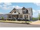 Stunning exterior elevation of a home with stone accents and well-manicured landscaping at 413 Horizon Trl, Canton, GA 30114