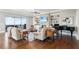 Bright living room with a stone fireplace, built-in shelves, and a grand piano at 413 Horizon Trl, Canton, GA 30114