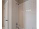 Bathroom featuring a tiled shower with a rainfall shower head at 6186 Talmadge Nw Run, Acworth, GA 30101