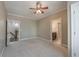 Spacious bedroom featuring neutral paint and easy access to the bathroom and hallway at 6186 Talmadge Nw Run, Acworth, GA 30101