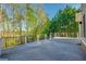 Backyard deck featuring unique geometric design and a beautiful view at 6186 Talmadge Nw Run, Acworth, GA 30101