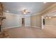 Open-concept living room features a fireplace, neutral paint, and recessed lighting at 6186 Talmadge Nw Run, Acworth, GA 30101