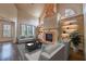 Bright living room with a tall fireplace, built-in shelving, and stylish furniture at 6186 Talmadge Nw Run, Acworth, GA 30101