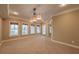 Bright living room featuring recessed lighting, several windows and neutral decor with ample space for furnishings at 6186 Talmadge Nw Run, Acworth, GA 30101