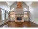 Spacious living room featuring a fireplace and hardwood floors at 6186 Talmadge Nw Run, Acworth, GA 30101
