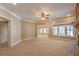 Spacious living room with neutral color paint and fireplace at 6186 Talmadge Nw Run, Acworth, GA 30101