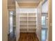 Pantry shelves with lots of storage capacity at 6186 Talmadge Nw Run, Acworth, GA 30101