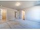 Spacious bedroom featuring neutral walls and plush carpet leading to closet and ensuite bathroom at 1500 Alcovy Station Rd, Covington, GA 30014