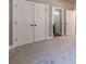 Bedroom featuring double doors to a closet and two other doors at 1500 Alcovy Station Rd, Covington, GA 30014