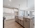 Spacious kitchen featuring granite counters, modern appliances, and a seamless transition to the living area at 1500 Alcovy Station Rd, Covington, GA 30014