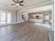 Open layout displaying the living room with patio access and the adjacent kitchen at 1500 Alcovy Station Rd, Covington, GA 30014