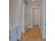 Hallway featuring white cabinetry with brushed gold hardware at 1670 Knob Creek Nw Ct, Acworth, GA 30101