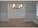 Bright living room with hardwood floors, wainscoting, and natural light at 1670 Knob Creek Nw Ct, Acworth, GA 30101